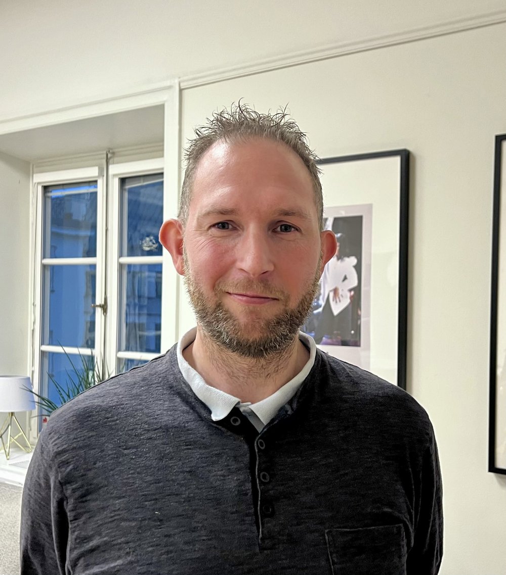 Porträttbild av David Lindau.